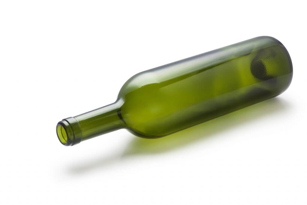 green glass wine bottle after alcoholic receives help from a christian alcohol recovery program